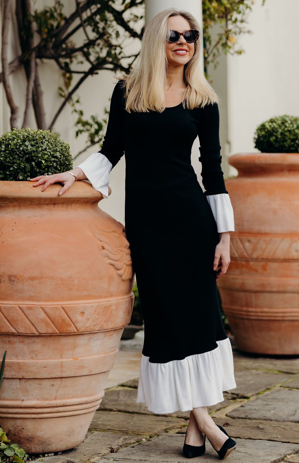 Black & Ivory Women&#39;s fitted merino wool dress with long sleeves and ruffle detail
