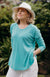 Turquoise Women&#39;s Merino Wool Long Sleeve Top with Raglan Sleeves
