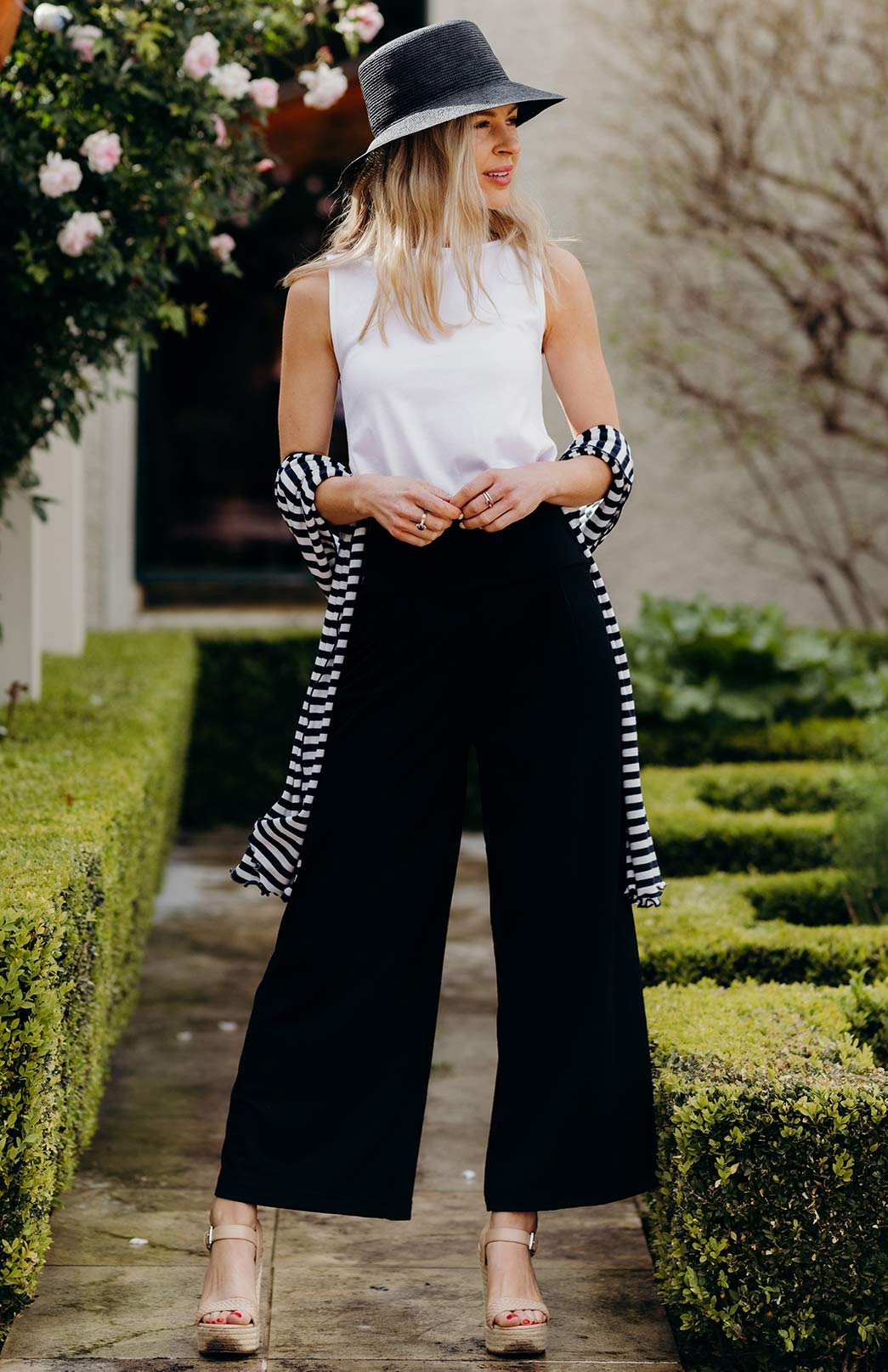 LONG CAMEL KNIT, WHITE TEE, BLACK WIDE LEG PANTS AND SUEDE CLOGS - Style Bee