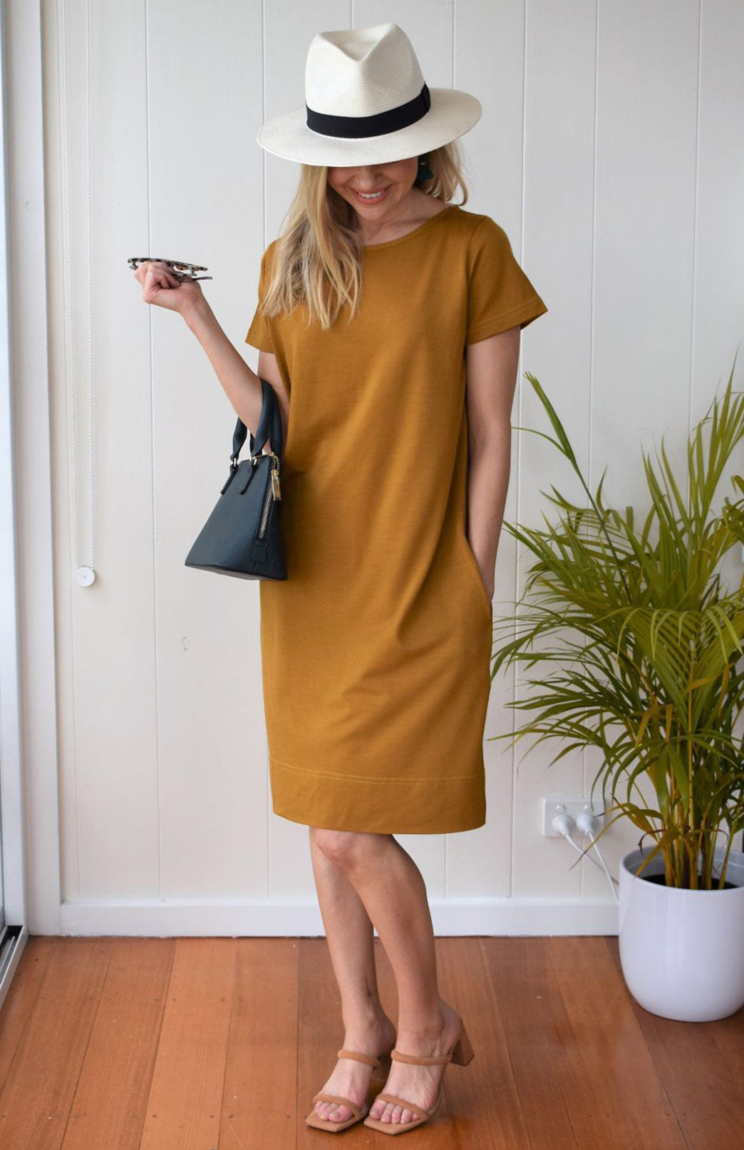 Short sleeve shift dress with clearance pockets